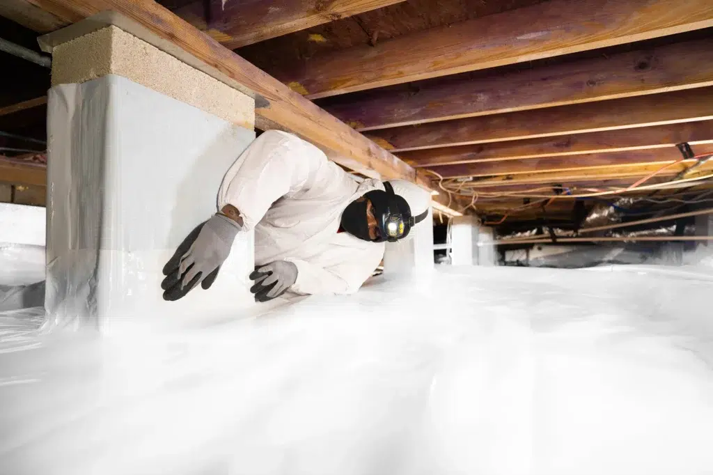 Installing crawl space vapor barrier
