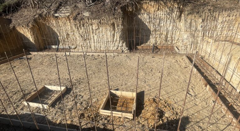 DMV soil and water table — clay soil saturation and hydrostatic pressure against basement wall