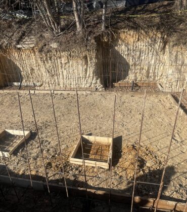 DMV soil and water table — clay soil saturation and hydrostatic pressure against basement wall