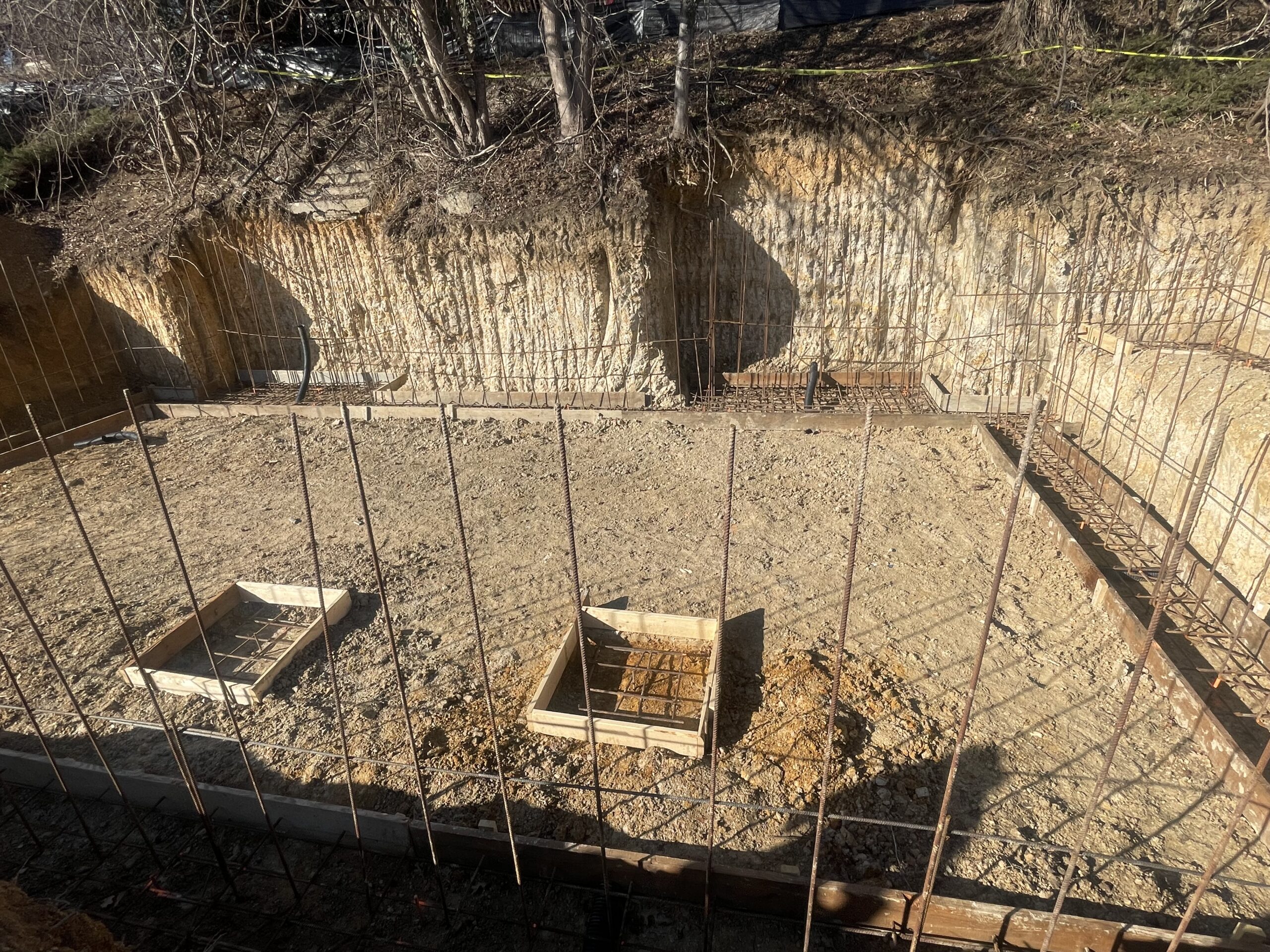 DMV soil and water table — clay soil saturation and hydrostatic pressure against basement wall