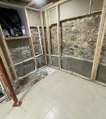 DMV foundation types — CMU, poured concrete, brick, and stone basement walls