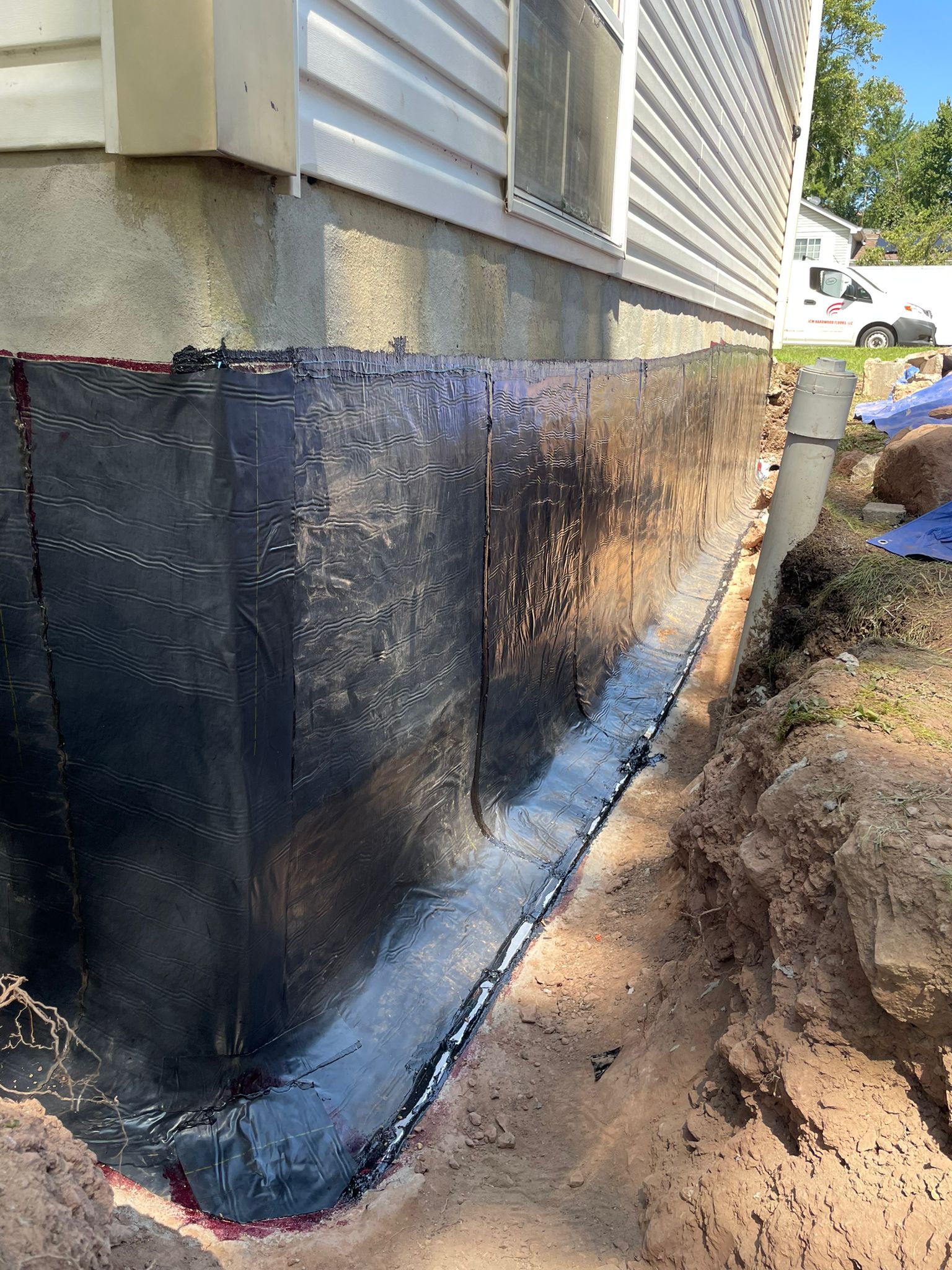 Bituminous sheet membrane installed over the foundation wall — Ashburn, VA