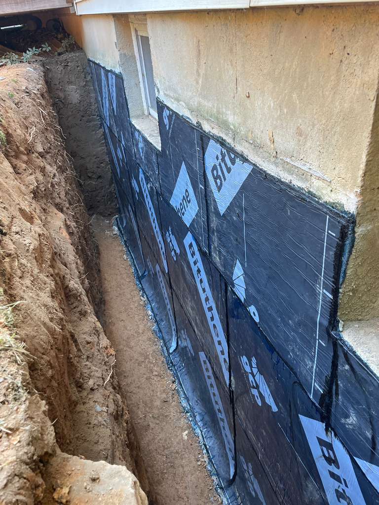 GCP Bituthene sheet membrane on the foundation wall