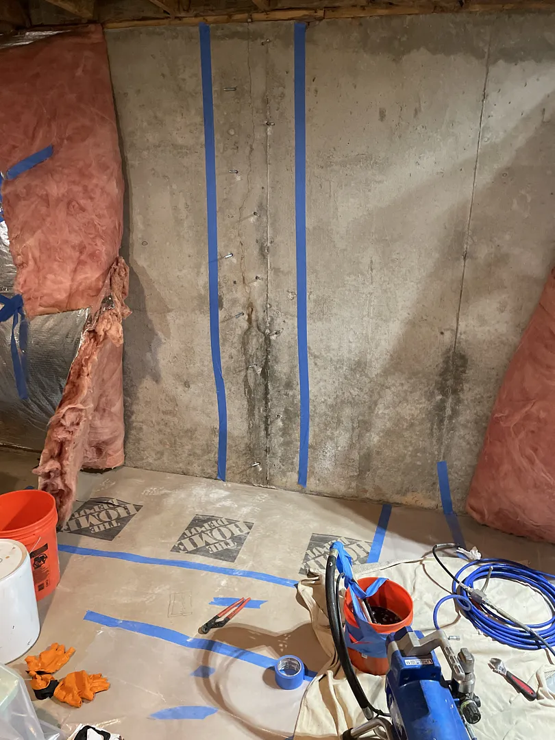 Gaithersburg, MD Foundation Crack Injection: A Later Repair at the Same Home 1 Marked Gaithersburg basement wall crack with injection ports already installed during the later repair