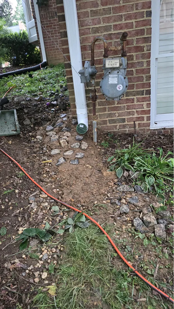 Downspout area during the Dunn Loring exterior drainage work