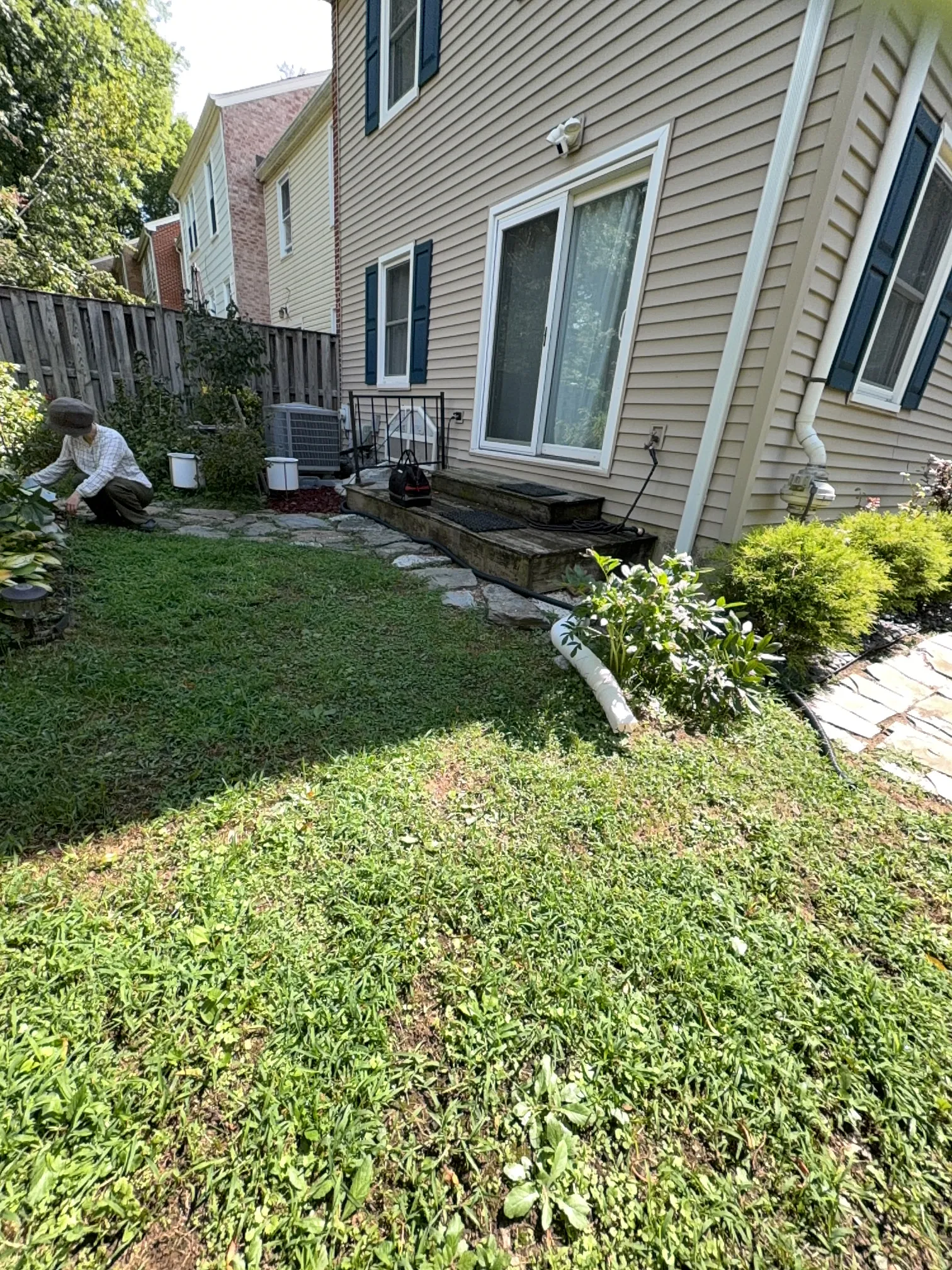 Rockville home before exterior window-well waterproofing